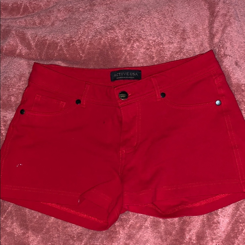 red shorts